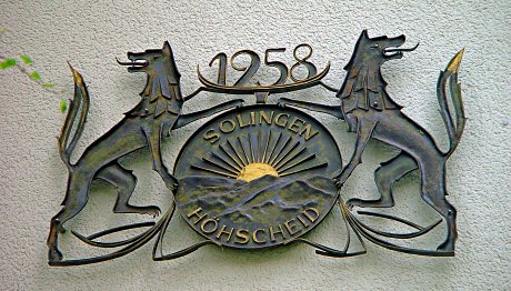 Foto: Hhscheider Stadtsiegel an einer Hauswand